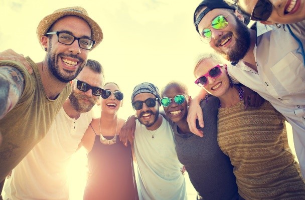 group of guys with glasses smiling 